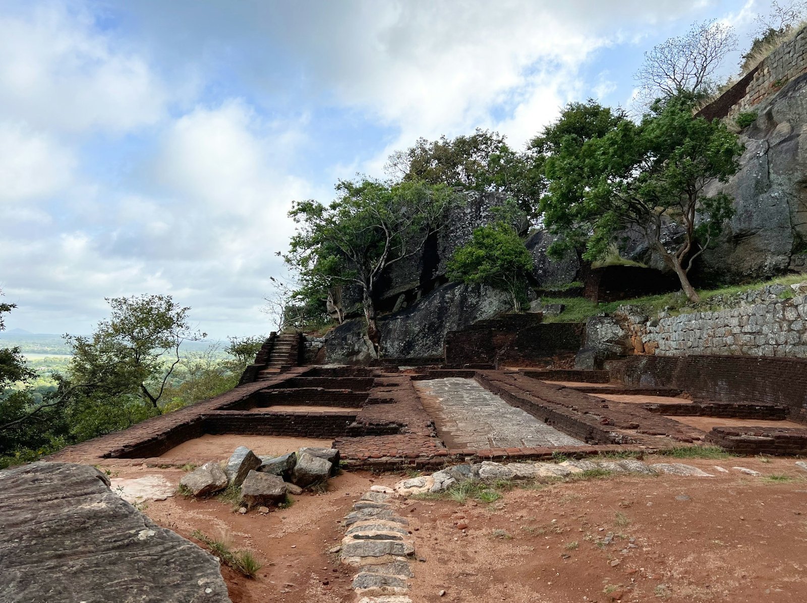 The stone terraces and steps leading up the granite rock face at Sigiriya, Sri Lanka